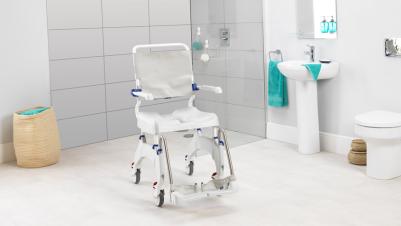 The Invacare Ocean Ergo Shower Chair in bathroom
